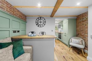 Kuchyň nebo kuchyňský kout v ubytování Tilly's Cosy Cottage Retreats - Castle Cottage