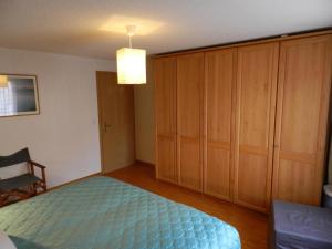 Postel nebo postele na pokoji v ubytování Apartment Hübeli - Chapman by Interhome
