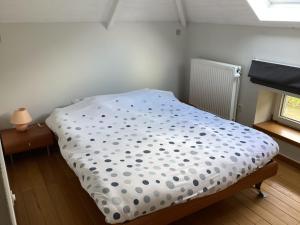 Postel nebo postele na pokoji v ubytování L eau et la pierre2