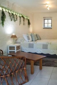 Χώρος καθιστικού στο Santika Getaway Cottage Stellenbosch