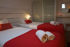 En eller flere senge i et værelse på Grandchildren's House