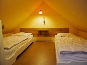 Fotografie z fotogalerie ubytování Maisonette Seebrise Mit Seeblick Am Strand v destinaci Flessenow