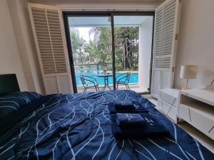 Postel nebo postele na pokoji v ubytování Laguna Beach resort 3 condo pattaya with deluxe nature and pool access ลากูน่า บีช รีสอร์ต 3 พัทยา + 49 fotografií