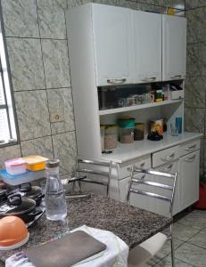 Kuchyň nebo kuchyňský kout v ubytování Quarto individual + 5 fotografií