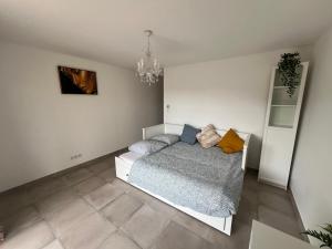 Postel nebo postele na pokoji v ubytování Chambres & Suites Villa architecte