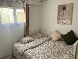 Postel nebo postele na pokoji v ubytování Chambres & Suites Villa architecte