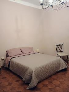 Postel nebo postele na pokoji v ubytování La Divina guest house