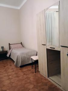 Postel nebo postele na pokoji v ubytování La Divina guest house