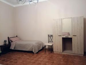 Postel nebo postele na pokoji v ubytování La Divina guest house