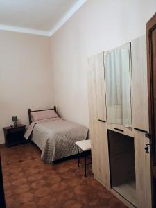 Postel nebo postele na pokoji v ubytování La Divina guest house