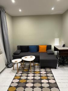 Posezení v ubytování Cherry Tree Cozy Rooms