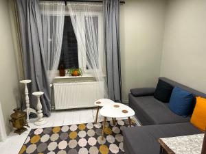 Posezení v ubytování Cherry Tree Cozy Rooms