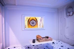 Postel nebo postele na pokoji v ubytování QUICK'HOT By GTS - capsules et chambres confortables