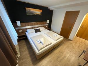 Posteľ alebo postele v izbe v ubytovaní Hotel-Landgasthof Katschtalerhof