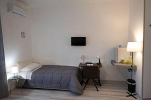 Lova arba lovos apgyvendinimo įstaigoje Luz de Salento B&B