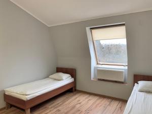 Postel nebo postele na pokoji v ubytování Budget Hotel Ekotel