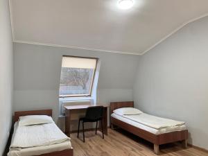 Postel nebo postele na pokoji v ubytování Budget Hotel Ekotel