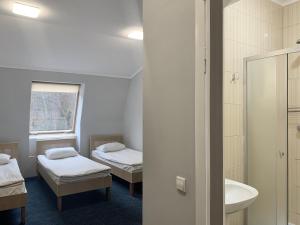 Postel nebo postele na pokoji v ubytování Budget Hotel Ekotel
