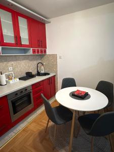 Kuchyň nebo kuchyňský kout v ubytování Apartment Infinity 2