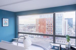 Una cama o camas en una habitación de GuestReady - Enchanting views from Millenium Tower