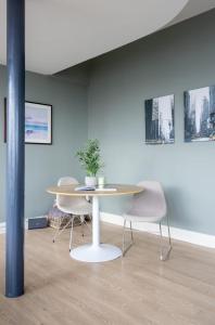 Un lugar para sentarse en GuestReady - Enchanting views from Millenium Tower