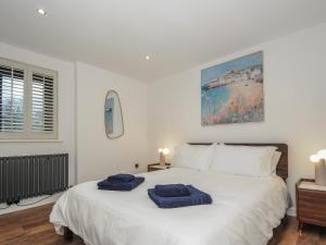 En eller flere senge i et værelse på Boathyde