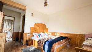 Voodi või voodid majutusasutuse Bayith Cafe and Stay toas