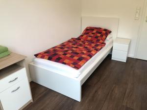 Letto o letti in una camera di Gästehaus Witteborg