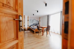 Posezení v ubytování Apartamenty U Joli