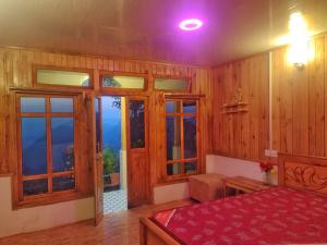 Postel nebo postele na pokoji v ubytování Nimzong homestay