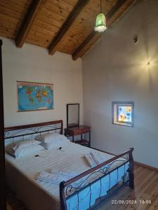 Postel nebo postele na pokoji v ubytování George Traditional Villa + 31 fotografií