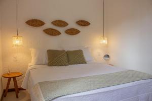 Ένα ή περισσότερα κρεβάτια σε δωμάτιο στο Villas Manatee Apartamento H101 Nobile Stays