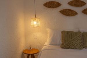 Ένα ή περισσότερα κρεβάτια σε δωμάτιο στο Villas Manatee Apartamento H101 Nobile Stays