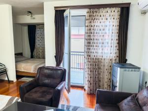 Χώρος καθιστικού στο Rafto Apartment