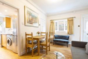 Et opholdsområde på Holiday House Close to Heathrow