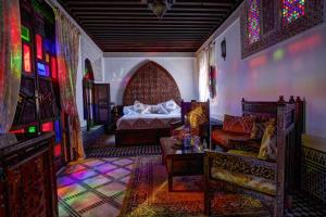 Postel nebo postele na pokoji v ubytování Riad Salam Fes