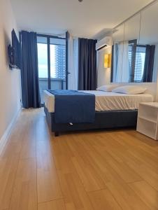 Postel nebo postele na pokoji v ubytování Orbi City - Luxury Hotel - Sea View