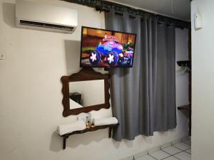 TV a/nebo společenská místnost v ubytování Hotel Rath