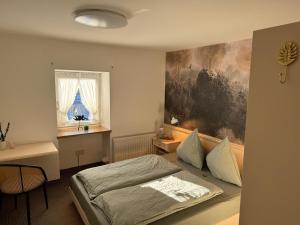 Posteľ alebo postele v izbe v ubytovaní Ferienwohnung Saunahaus