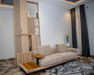 Posezení v ubytování Nine A Apartment