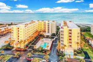an aerial view of a hotel and the ocean at Sandcastles 2br2ba Cocoa Beach Ocean Views! in Cocoa Beach