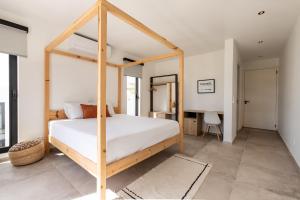 Postelja oz. postelje v sobi nastanitve LXRY Villas