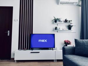 TV a/nebo společenská místnost v ubytování UNDE Home