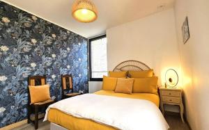 Postel nebo postele na pokoji v ubytování Gîte de France Le nid des grisets 4 épis - Gîte de France 8 personnes MAE-4591