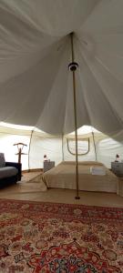 Postel nebo postele na pokoji v ubytování terrebio Glamping + 4 fotografie