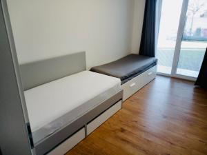 Ένα ή περισσότερα κρεβάτια σε δωμάτιο στο Cozy house in Pezinok