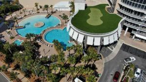 an overhead view of a swimming pool in a resort at Laketown Wharf 1817 in Panama City Beach