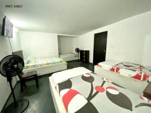 Una cama o camas en una habitación de Hospedaje DJ 5 fotos más