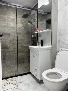 Et badeværelse på WPP Apartament