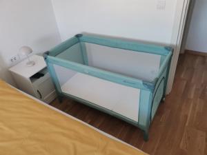 En eller flere senge i et værelse på Apartman Luni
